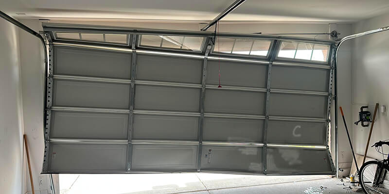 How to Fix a Garage Door Off Track - Genesis garage door